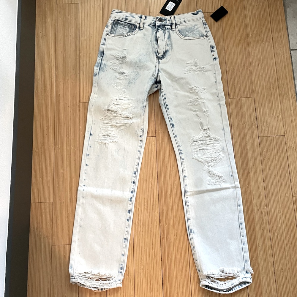 Ripped light wash straight leg jeans